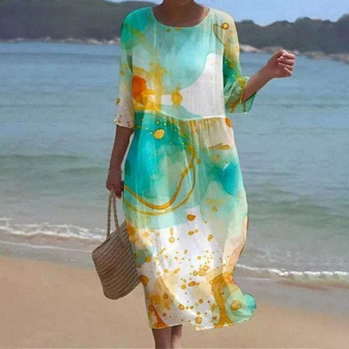 Nathalie | Graceful floral dress covering the belly