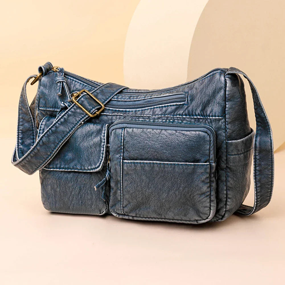 Lys | Vintage leather shoulder bag with several pockets